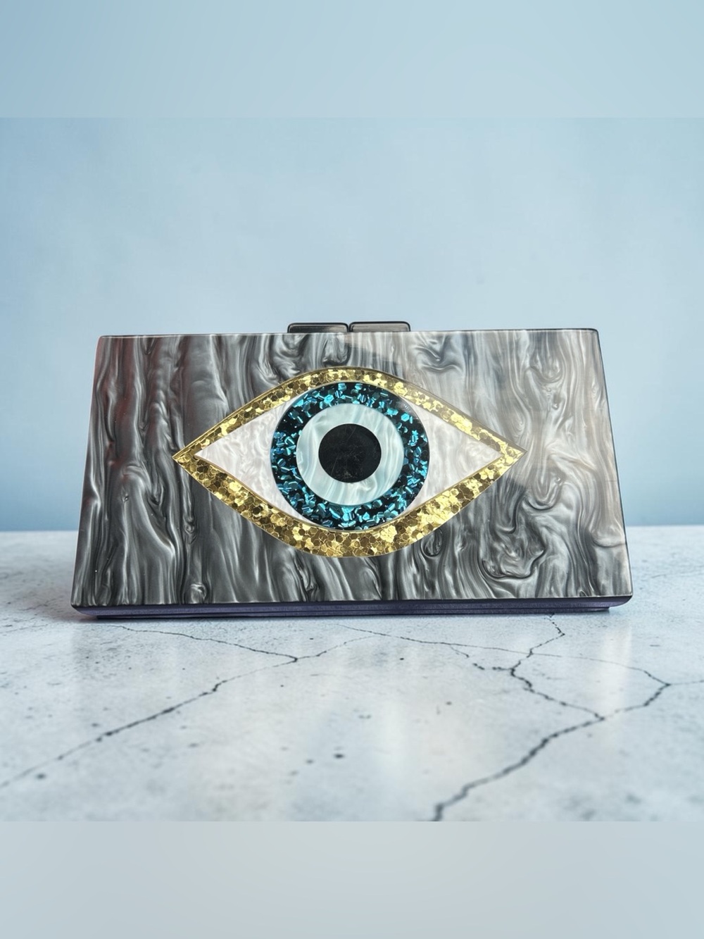 Evil Eye Acrylic Clutch in Gray with Gold and Blue Accents